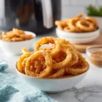 Crispy fried onions made in an air fryer, golden and crunchy topping for dishes