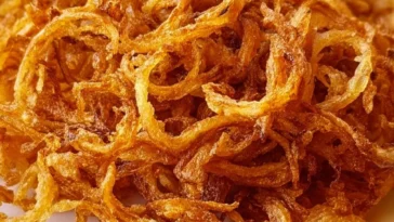 Crispy fried onions made in an Instant Air Fryer, golden and crunchy.
