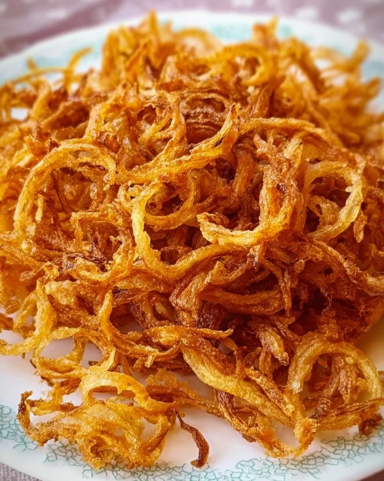 Crispy fried onions made in an Instant Air Fryer, golden and crunchy.