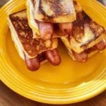 Air fryer grilled cheese hot dogs with melted cheese and crispy bread