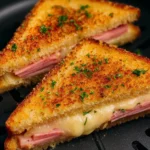 Air Fryer Grilled Ham and Cheese sandwich with melted cheese and crispy edges