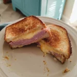 Crispy Air Fryer Ham and Cheese Sandwich with golden brown bread and melted cheese