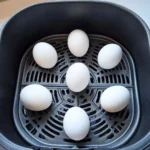 Perfectly cooked air fryer hard boiled eggs on a plate