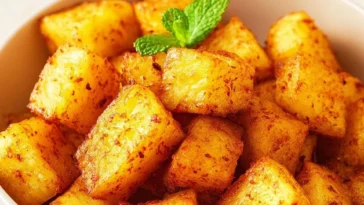 Delicious air fryer pineapple bites served on a plate
