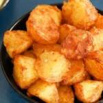 Crispy air fryer roast potatoes served in a bowl