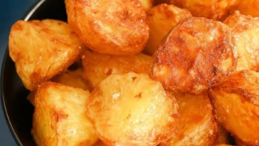Crispy air fryer roast potatoes served in a bowl