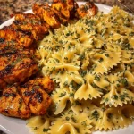 Creamy garlic Parmesan chicken bowtie pasta with mozzarella cheese sauce
