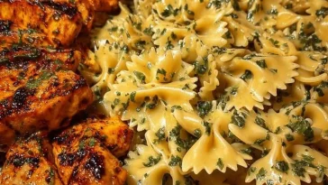 Creamy garlic Parmesan chicken bowtie pasta with mozzarella cheese sauce