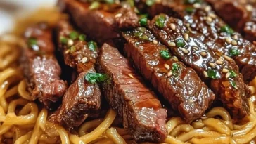 Garlic Butter Steak served with Lightning Noodles for a flavorful dish