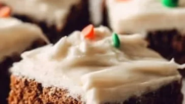 Delicious gingerbread cookie bars topped with icing and festive decorations