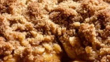 Delicious old fashioned apple crisp with baked apples and oat topping