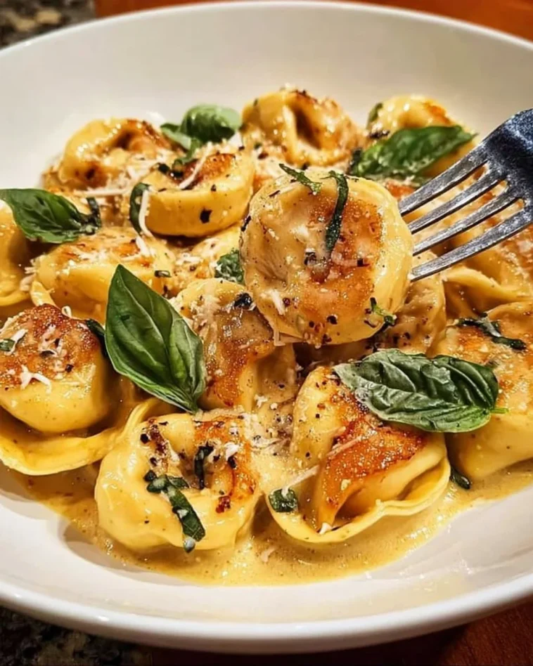 Rotini with beef in creamy garlic Parmesan sauce served in a bowl