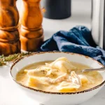 Delicious serving of Chicken and Dumplings with herbs and spices