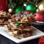 Delicious homemade Christmas Toffee candy on a festive plate
