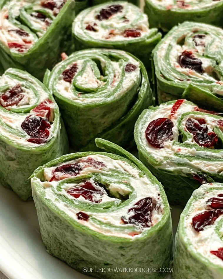 Cranberry Jalapeño Pinwheels on a platter, showcasing vibrant colors and textures.