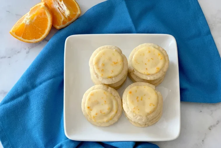 Freshly baked Orange Meltaway Cookies on a cooling rack