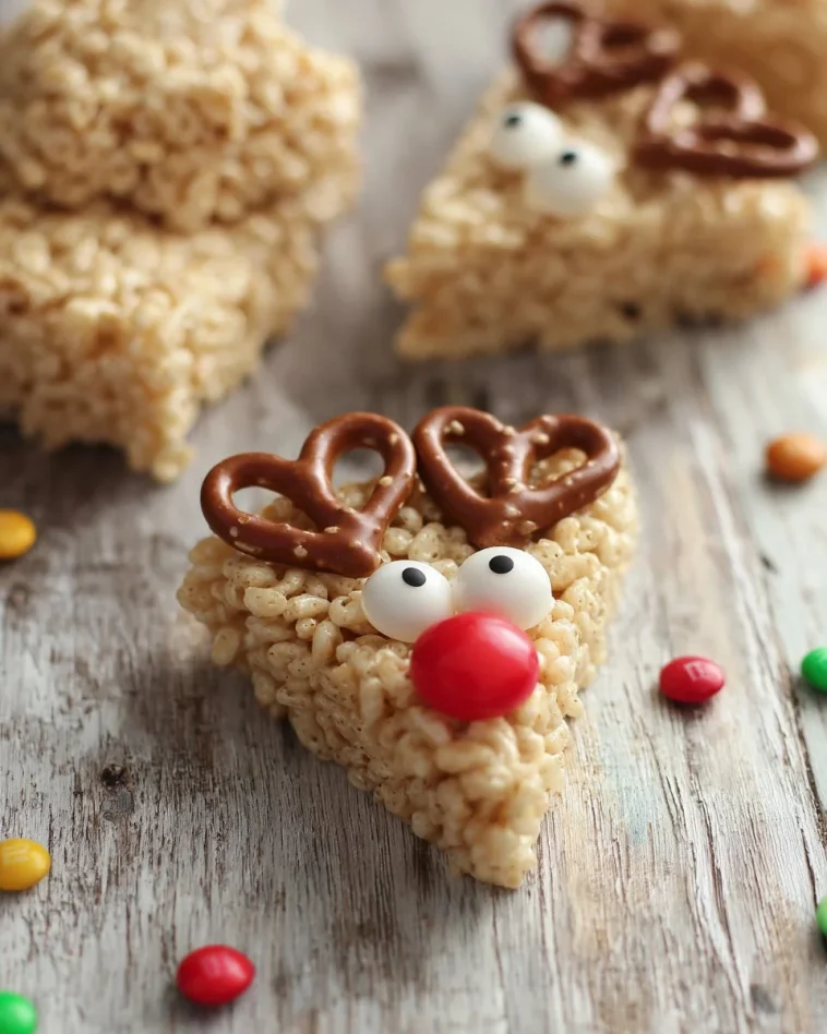 Festively decorated Reindeer Rice Krispie Treats on a platter