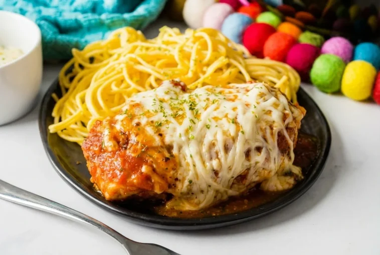 Delicious Slow Cooker Chicken Parmesan dish ready to serve