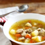 Whole30 Instant Pot chicken soup with vegetables in a bowl