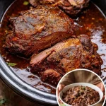 Mom's Sunday Roast with rich gravy and tender, juicy meat.