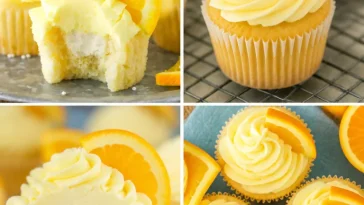 Orange cream cupcakes with creamy frosting topped with orange slices